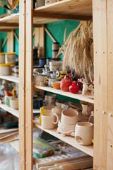 shelf with pottery at art studio