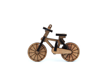 Fototapeta na wymiar Wooden bicycle toy isolated on white background 