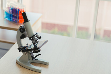 Modern Chemical Research Laboratory with Microscope and Test Tubes.
