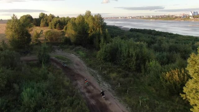 Aerial filming of racing motocross bikes in Tomsk. Siberia, Russia.