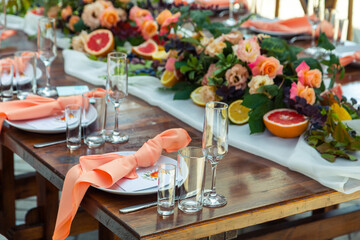Table served for wedding dinner, close up view. decoration concept for citrus weddings party or social events