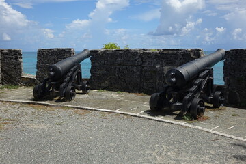 Old cannons in fortress on tropical island, Fort St. Catherine's, Bermuda
