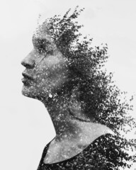 Portrait of young woman combined with photograph of tree and leaves. Creative. Double exposure, nature style.