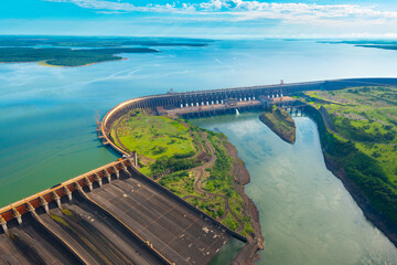Aerial view of the Itaipu Hydroelectric Dam on the Parana River. - obrazy, fototapety, plakaty
