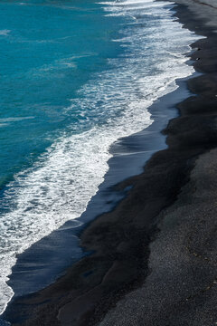 Abstract Aerial View Of Reynisfjara Black Sand Beach In Iceland