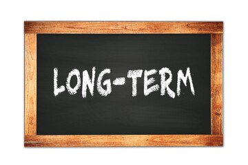Fototapeta premium LONG-TERM text written on wooden frame school blackboard.