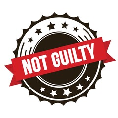 NOT GUILTY text on red brown ribbon stamp.