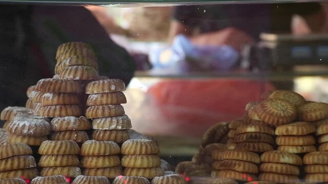 Stacks of traditional pastries in bakery, West Bank, Palestine