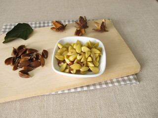 Shelled and cooked beechnuts in a small bowl