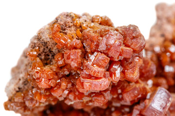 Macro mineral stone Vanadinite on a white background