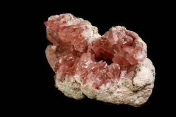 Macro mineral stone Pink Amethyst on a black background