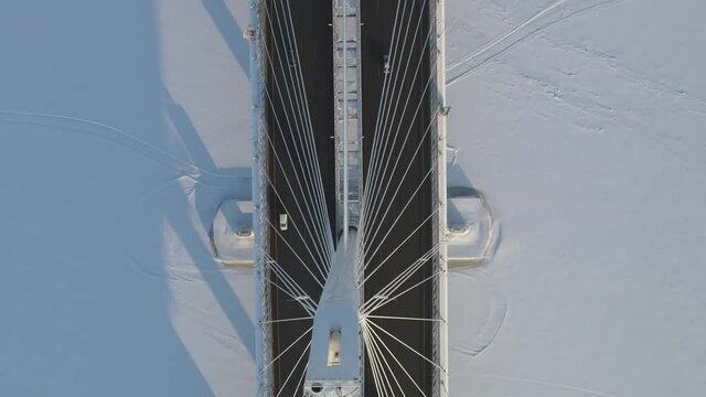 Aerial view of the Western High-Speed Diameter in winter, frozen river Neva in winter.