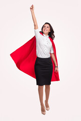 Powerful woman flying with red cape