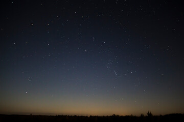 Fototapeta na wymiar Night sky. Stars in the dark autumn sky.