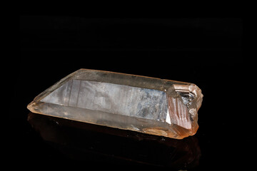 Macro mineral quartz stone on a black background