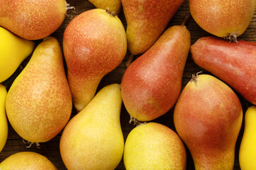 fresh ripe pears as background, top view