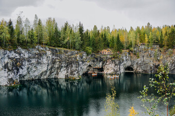 Fototapeta na wymiar Abandoned marble canyon in the mountain park of Ruskeala, Karelia, Russia. Awesome autumn landscape.