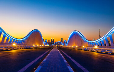Beautiful view of Meydan Bridge in Dubai. Modern artistic bridge in Dubai. Night architectural shot...