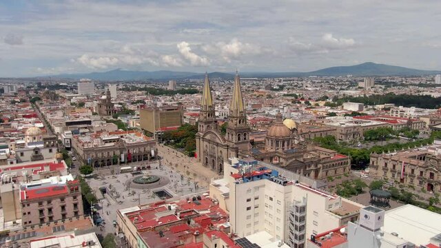 North East Side View Of Guadalajara Cathedral And Main Square With A View Of City In Jalisco, Mexico.- aerial forward