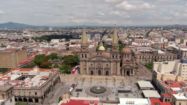 Guadalajara Cathedral And City Hall - Exterior View Of Cathedral of the Assumption of Our Lady In Metropolis Of Jalisco In Mexico. - aerial orbit left