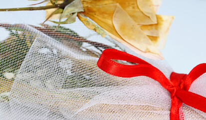 wedding concept detail of a bouquet flowers with ribbon