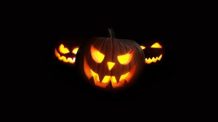 Scary Pumpkins glow at night. Halloween picture on a black background. Fear and the holidays concept