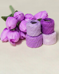 Embroidery thread made especially for embroidery. Yarn with a fine and soft texture. Embroidery threads of various colors. Yarn mockup. Focus blur.