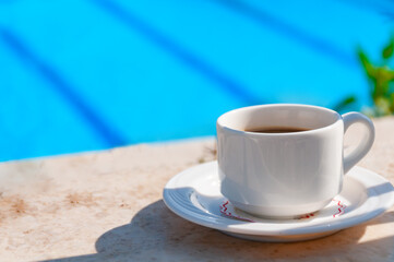 mug with coffee on a table in a cafe