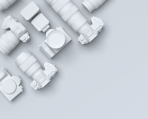 Top view of monochrome designer workspace and photography gear on black table