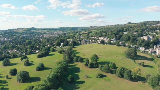 Aerial drone shot of Victoria Park, green city space in Bath, Somerset, UK