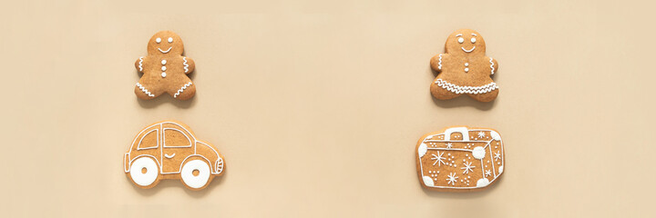 Happy New Year banner, gingerbread man and woman, suitcase and car on beige background.