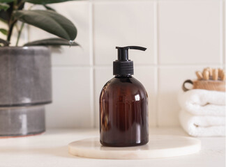 Brown bottle mockup for bathing products in bathroom
