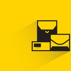 mail with shadow on yellow background