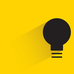 light bulb icon with shadow on yellow background