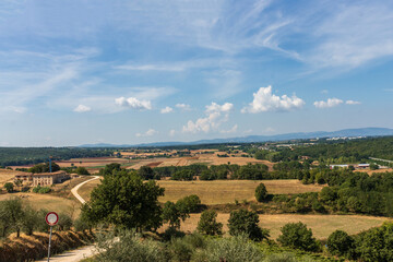 Fototapeta na wymiar High angle view of tuscan hills (province of Siena). Daylight. Copy space
