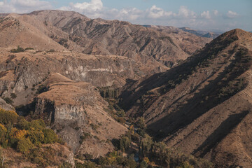 Picturesque mountain view in town in Armenia. Scenic mountain view on the sunrise in the Caucasus. Tourism in Armenia. High quality photo