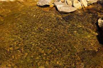 Patterns and rocks seen from the stream