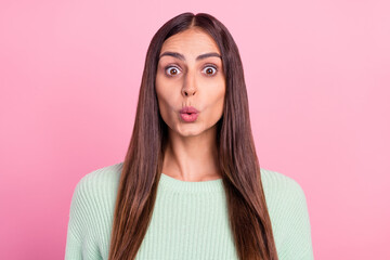 Photo of impressed young brunette lady wear green pullover isolated on pink color background