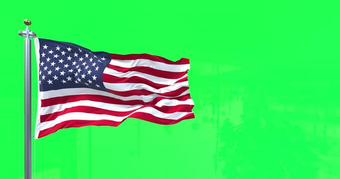 American flag waving in the wind with green screen in the background