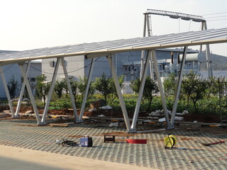 Fototapeta premium Photovoltaic carport construction and completion photos