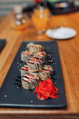 Tasty sushi on plate, closeup