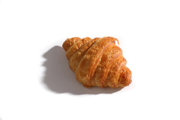 Croissant isolated in  wihite background with sunny light