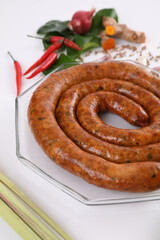 Local Northern Thai food , Northern Thai spicy sausage street food isolated in white background