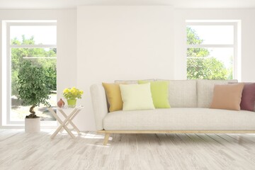White living room with sofa and summer landscape in window. Scandinavian interior design. 3D illustration