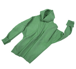 Green knitted long sleeve sweater fly isolated on white. Crunpled moving clothes. Laundry.