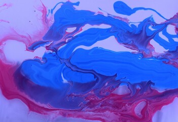 Abstract crimson-blue marble background. The lines and waves of acrylic paint create an interesting structure. Background for web design, fabric, design, laptop case.
