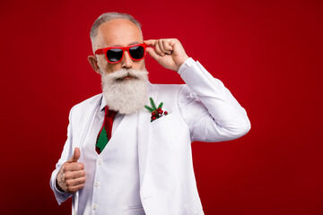 Photo of nice elder white hair man look empty space wear spectacles white jacket isolated on red color background