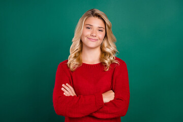 Photo of young school girl happy positive smile folded hands intelligent isolated over green color background