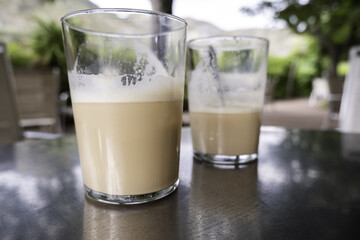 Glass of coffee with milk