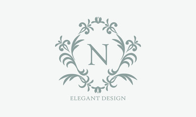 Exquisite design of an elegant monogram with the letter N in the center in gray. Logo for boutiques, cafes, bars, restaurants, invitations. Business style and brand of the company